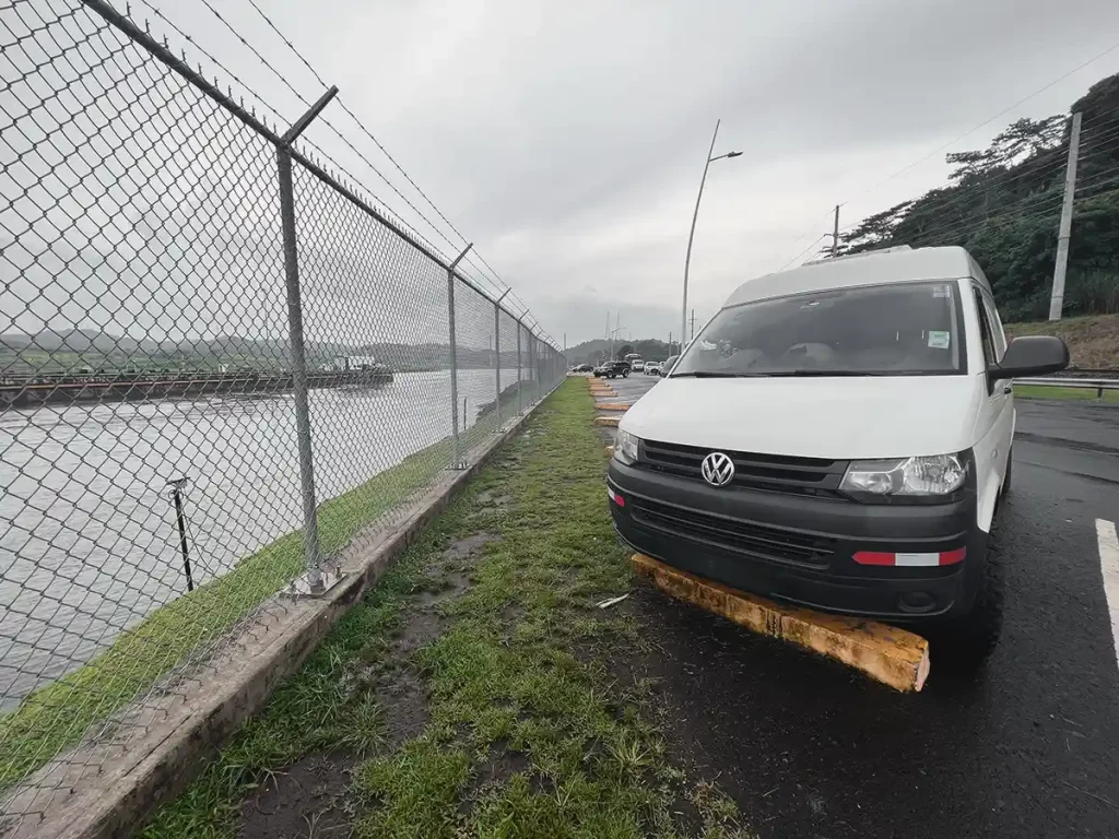 Campervan on the wire fence 